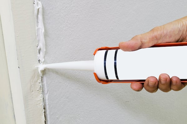 Apply caulk to cracks to prevent bed bugs